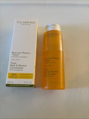Clarins Tonic Bath & Shower Concentrate — White with Yellow Accents
